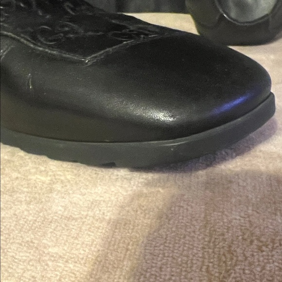 Gucci Embossed Black Leather Loafers main image 15